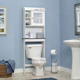 A bathroom featuring a toilet, sink, and a cabinet against a neutral wall.